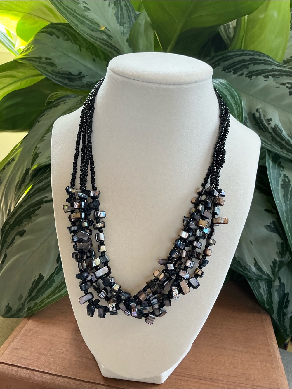 Multi-Strand Black Iridescent Shell And Bead Necklace